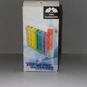 Weekly pop-up pill organizer